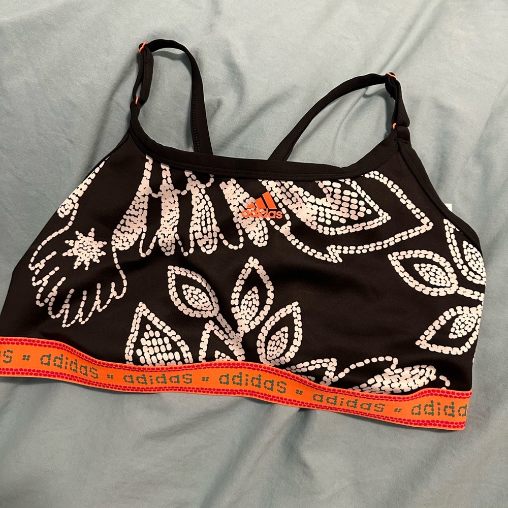 Black and orange Adidas sports bra
